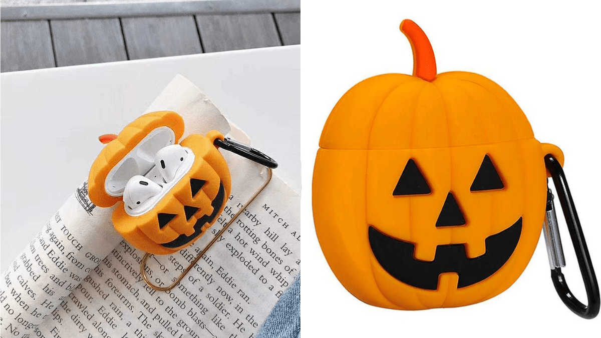 Airpod case cover in the shape of a Jack-o-Lantern pumpkin opened and displayed on an open book on the left side. The airpod case cover in the shape of a Jack-o-Lantern pumpkin's displayed as the front view.
