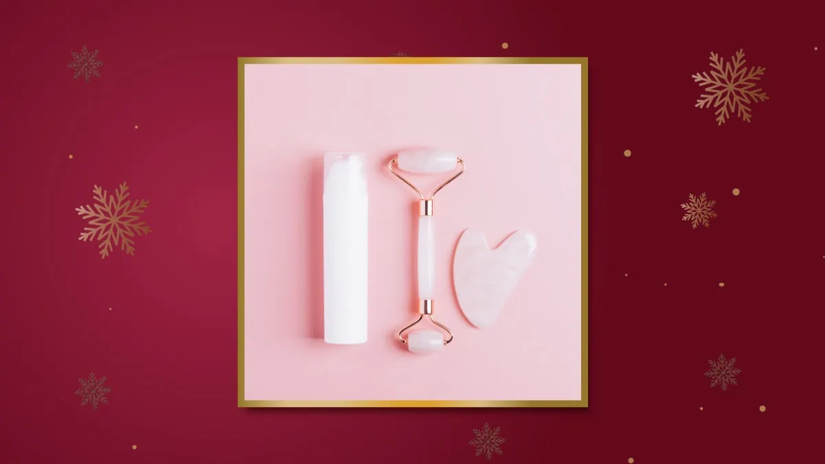 a facial massager on a pink surface, Christmas Gift For Her