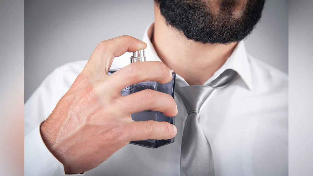 a man spraying natural deodorant, a secret santa gift