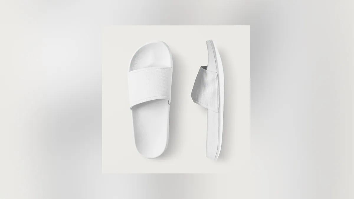 a pair of slippers on a white surface, a secret santa gift