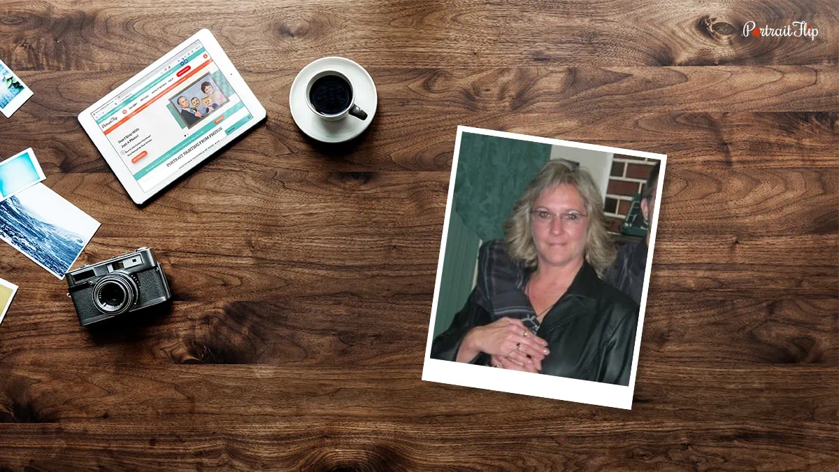 Photograph of an old woman placed on a table 