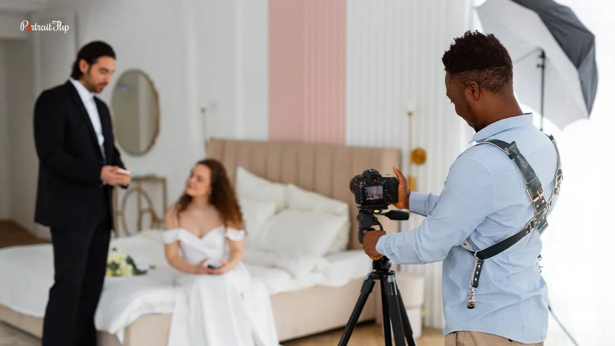 bride and groom with their photographer 