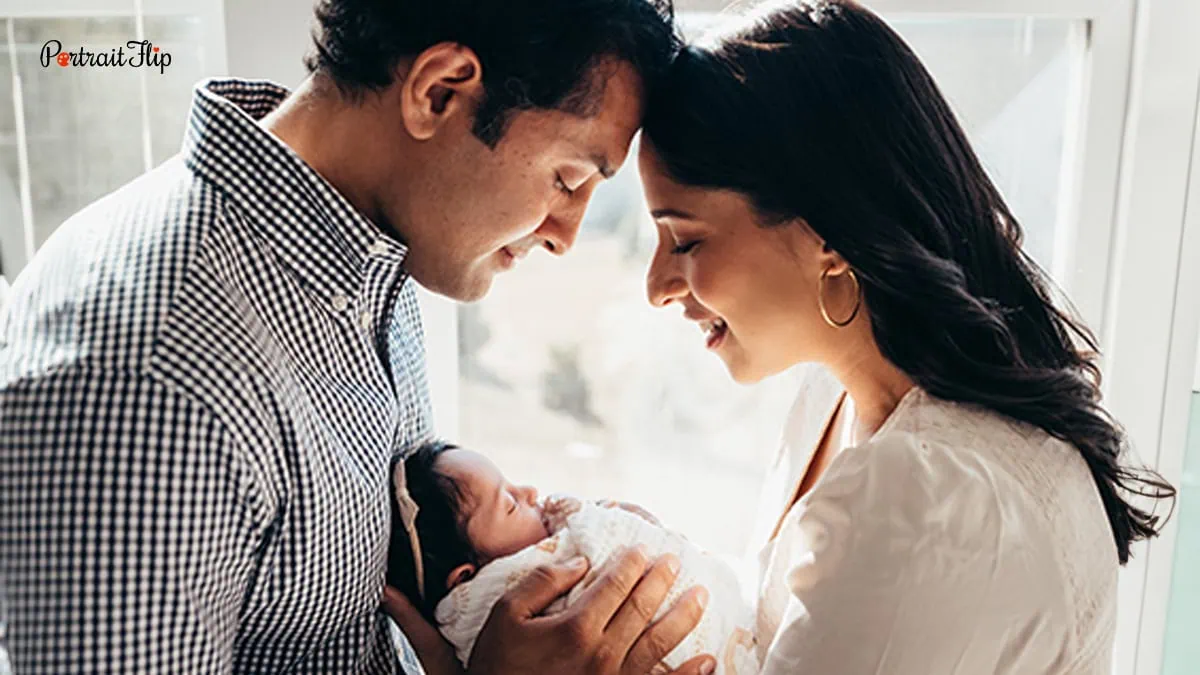 newborn baby with parents