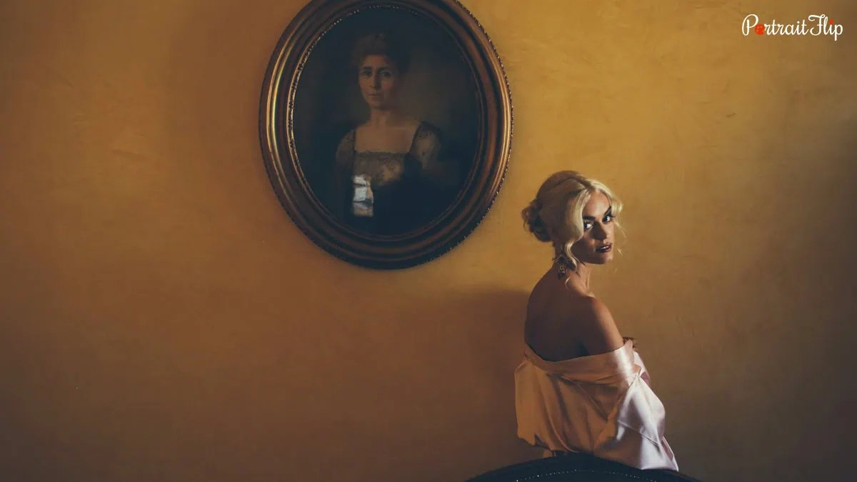 a woman posing with a vintage background